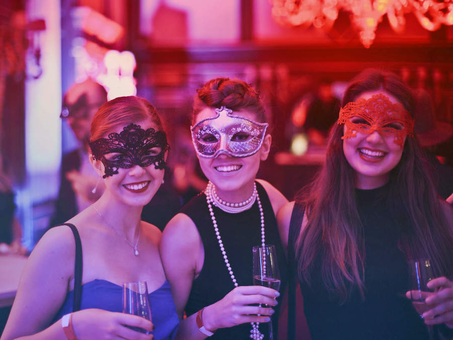 Young ladies dressed to impress and enjoying the occasion.